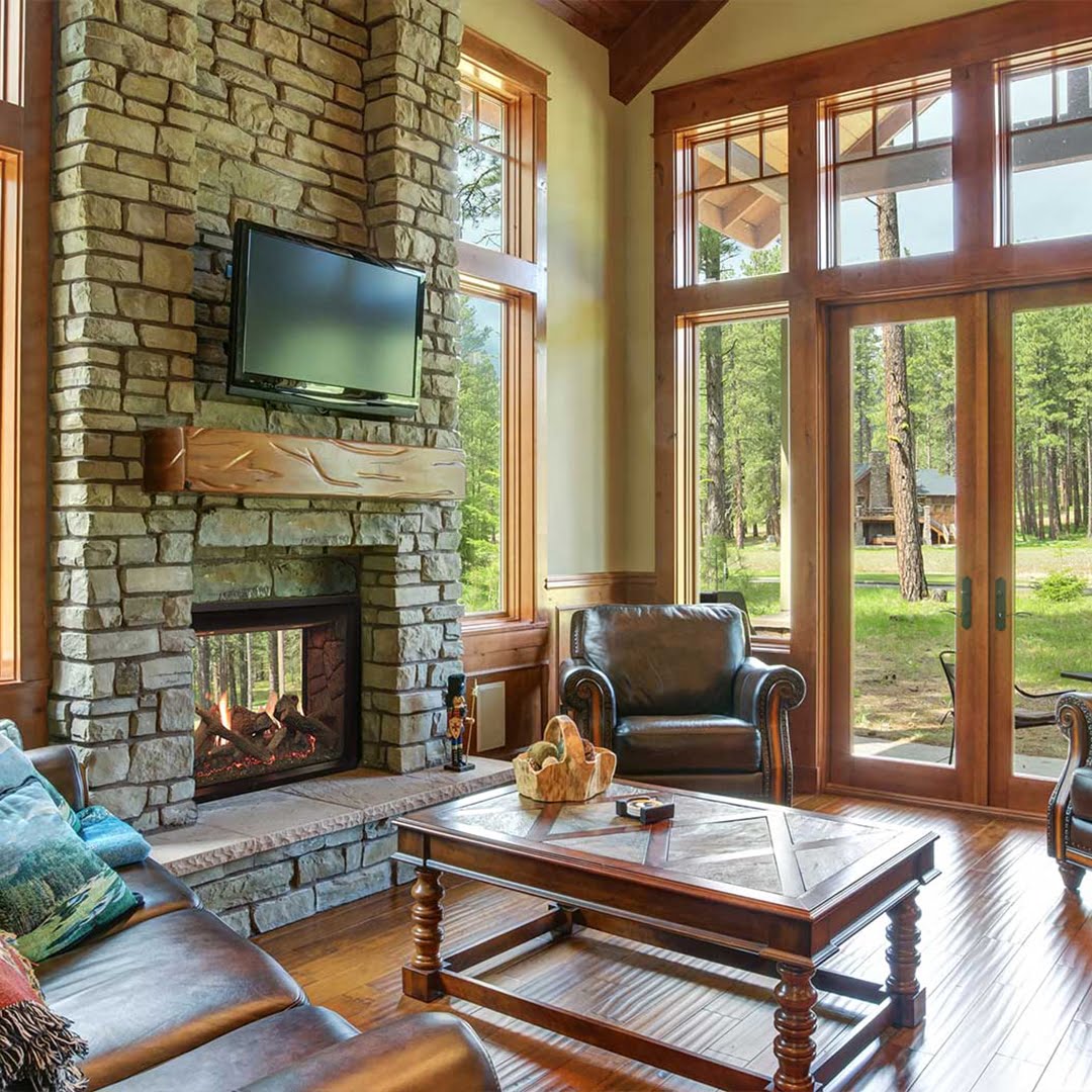 see through fireplace in rustic living room