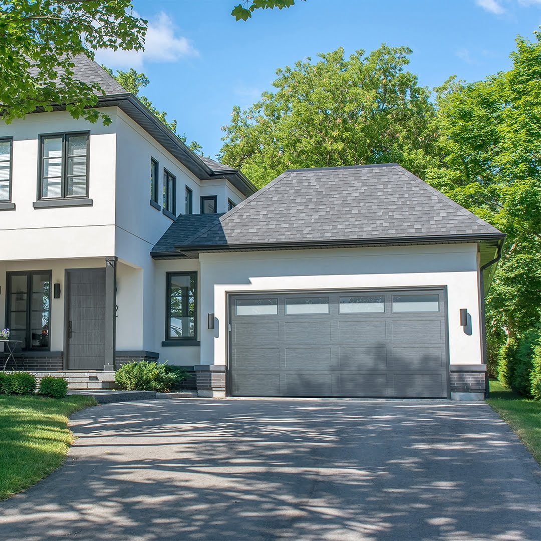 gray garage door on modern house