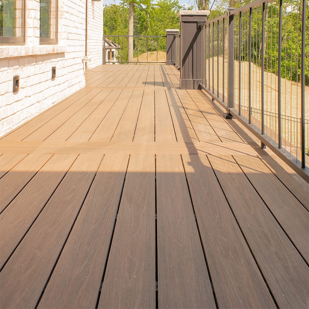 large deck with brown composite wood planks