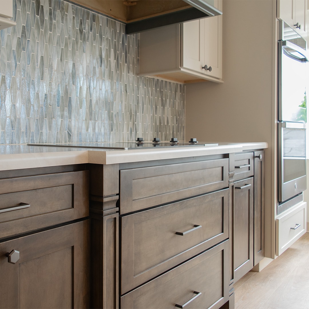 walnut stained wood lower kitchen cabinets