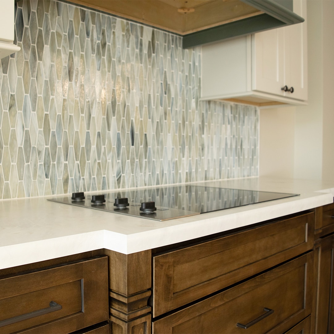 kitchen stovetop on quartz countertop