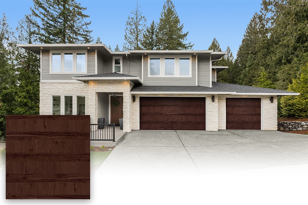 modern home with faux wood steel garage doors