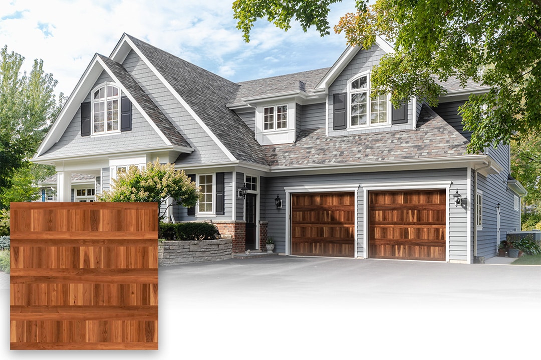 colonial home with faux cedar wood garage doors