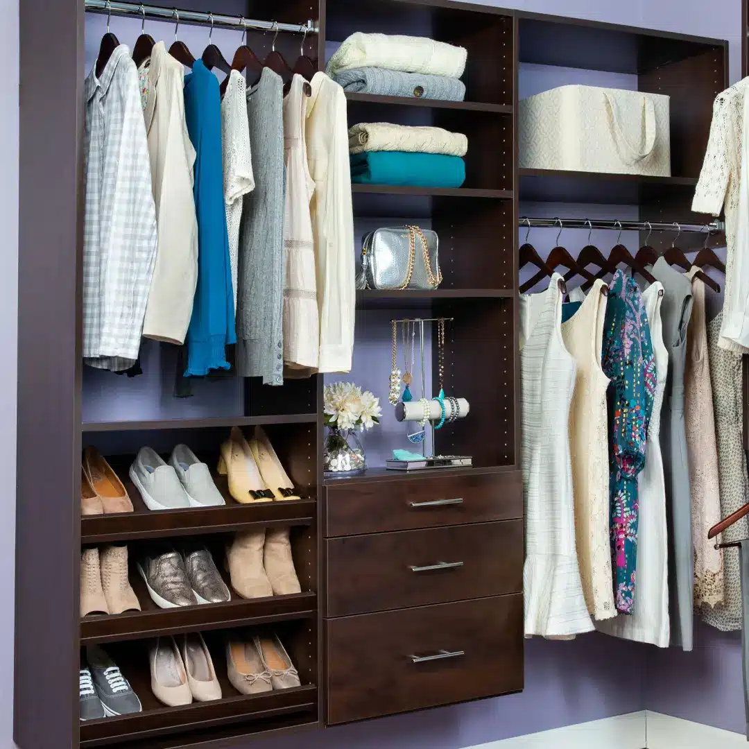 luxurious built-in closet system finished in brown stain