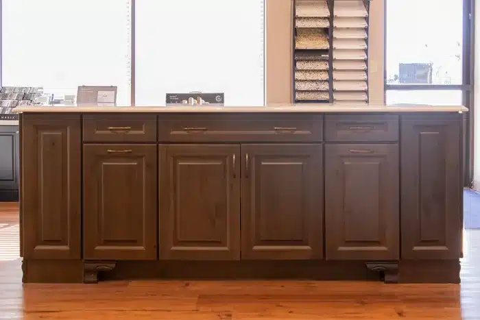 kitchen island with four cabinet doors and four drawers