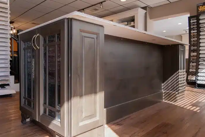 kitchen island with decorative glass cabinet doors