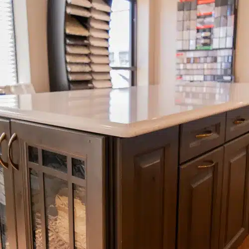 kitchen island with stained wood cabinets