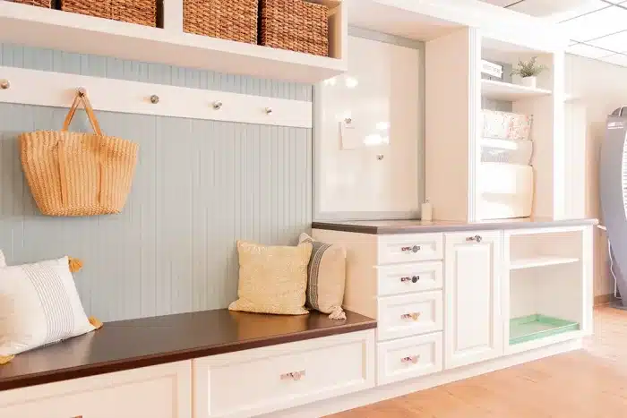 large cabinetry storage with bench seating