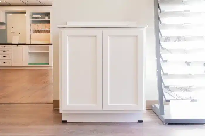 tall white bathroom vanity in cabinet showroom