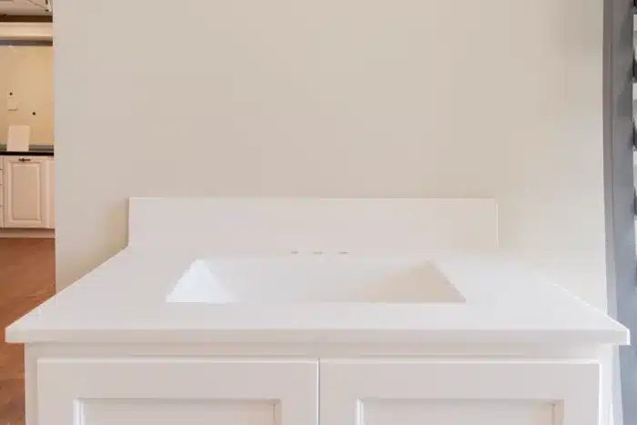 white marble sink bowl on bathroom vanity