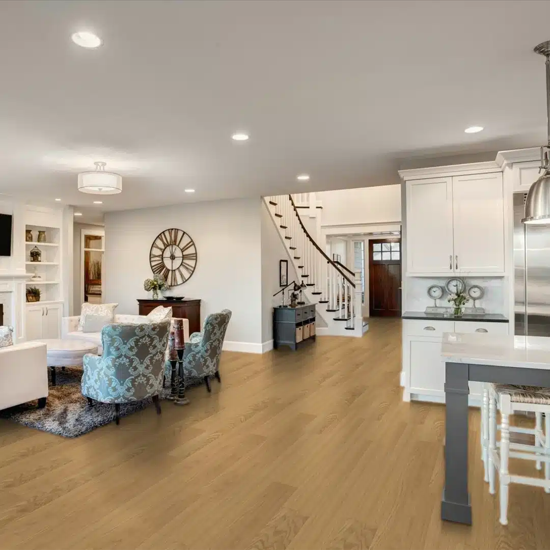 kitchen and living room with light-colored wood flooring