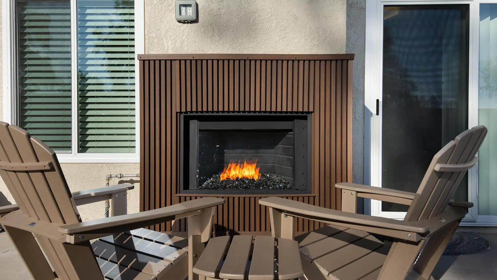 outdoor fireplace with european style cladding on mantel