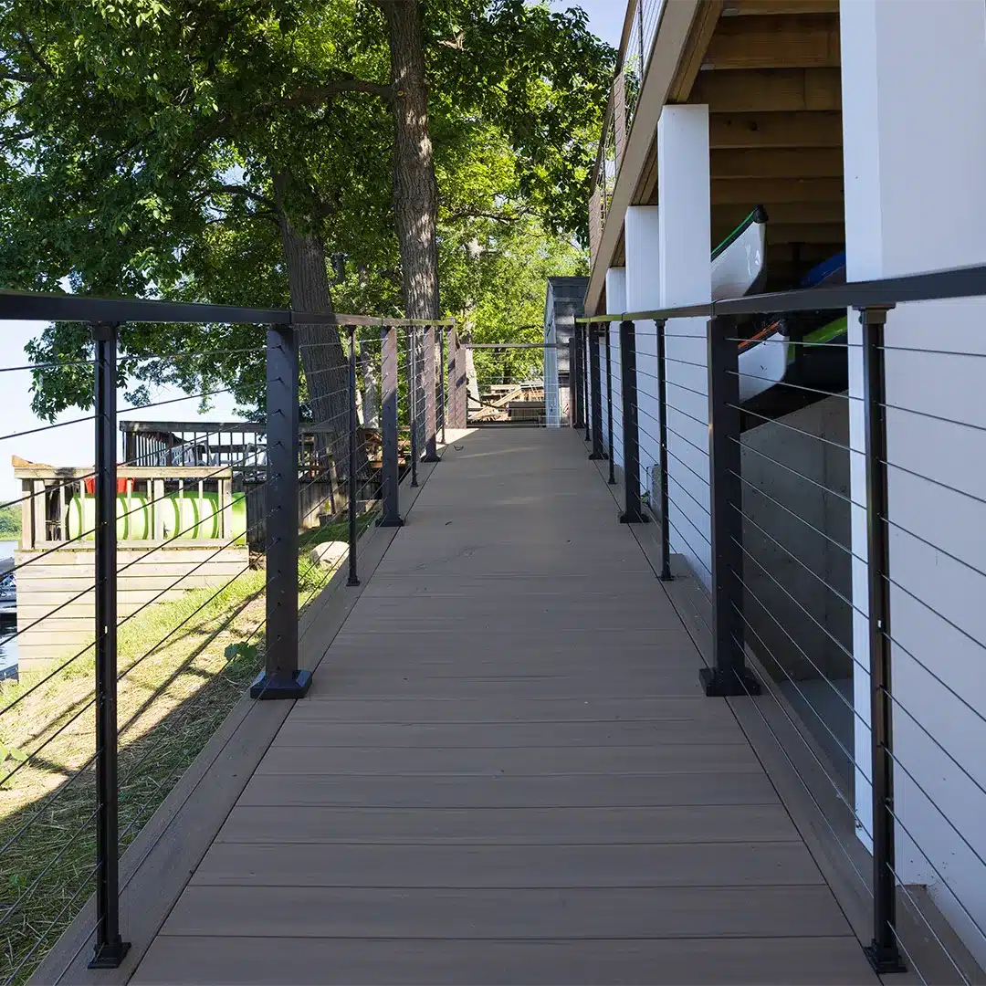 wheelchair ramp on deck enclosed by black railing