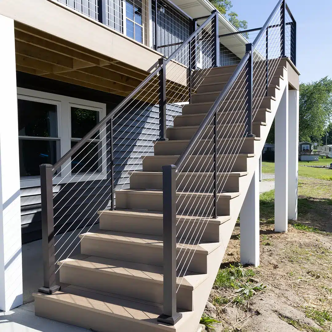 outdoor deck staircase with black railing