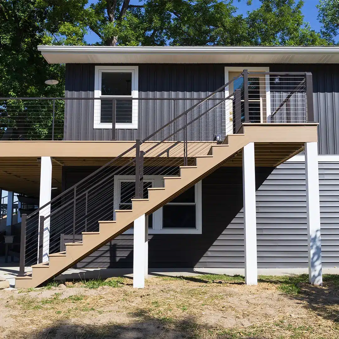 large elevated deck with black cable railing