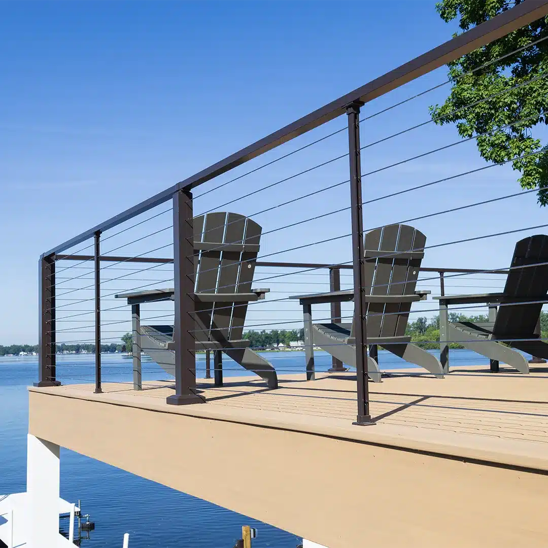 deck overlooking lake with black aluminum railing