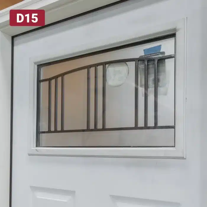 window on entry door with wrought iron