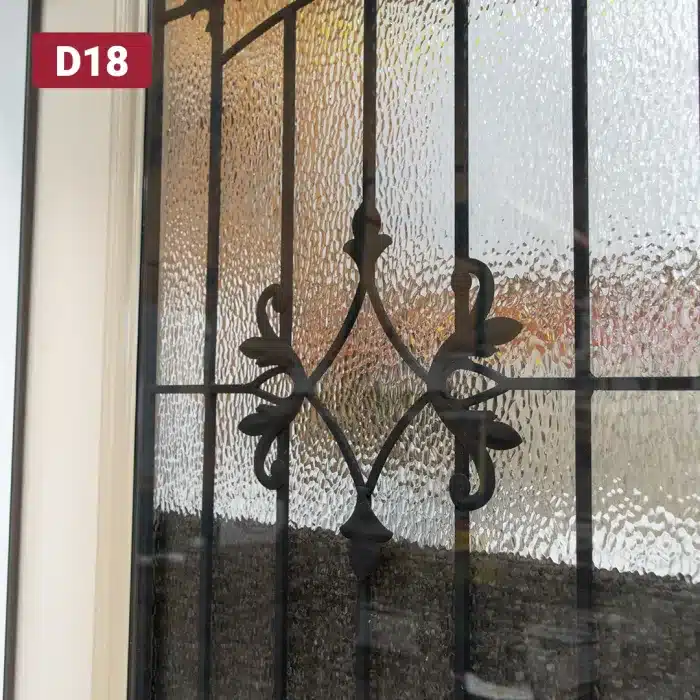 decorative wrought iron design in door glass