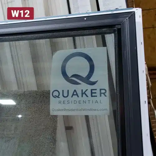 quaker manufacturing sticker on glass window pane