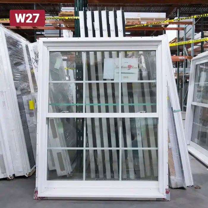 white vinyl window with grids