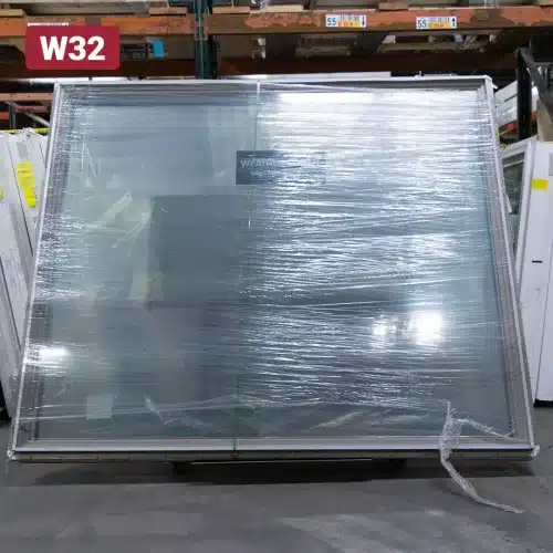 large picture window covered in plastic shrink wrap