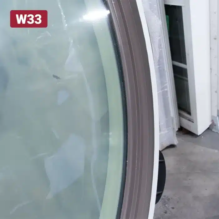 curved aluminum casing on window