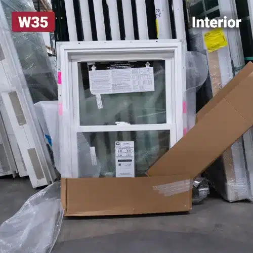 white vinyl window wrapped in cardboard packaging