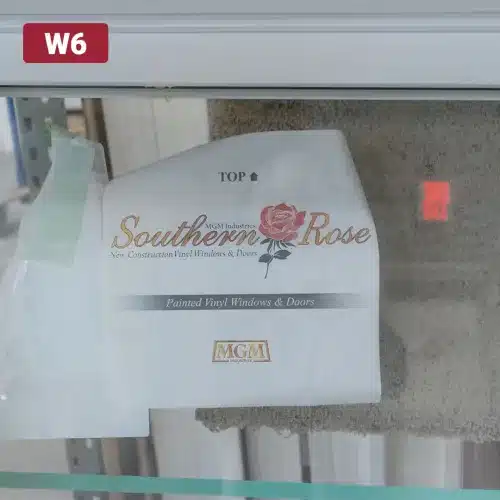 southern rose brand name sticker on glass window pane