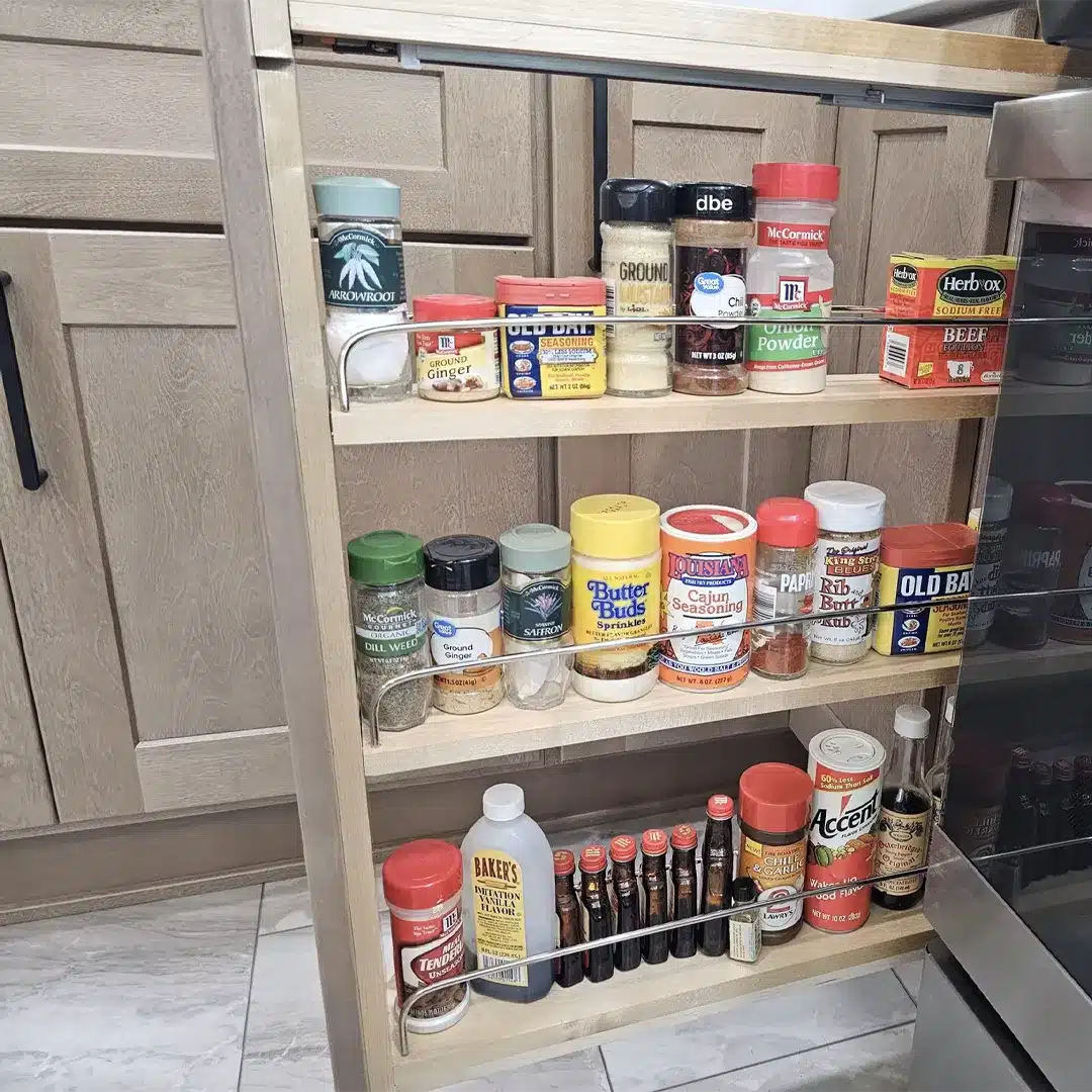 pullout spice rack cabinet in modern kitchen