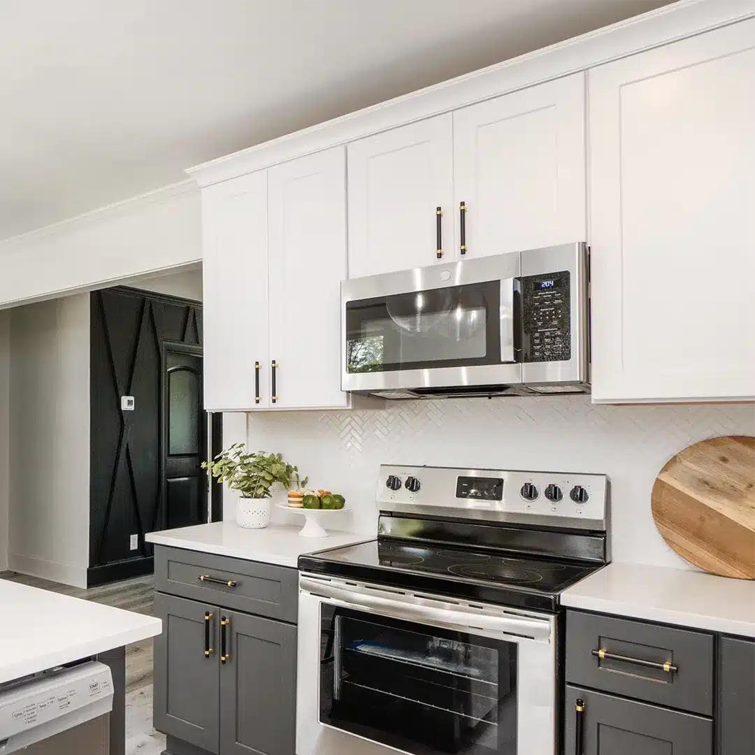 white upper cabinets in remodeled kitchen